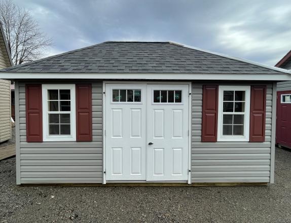 10x16 Hip Roof with Vinyl Siding and Shelves